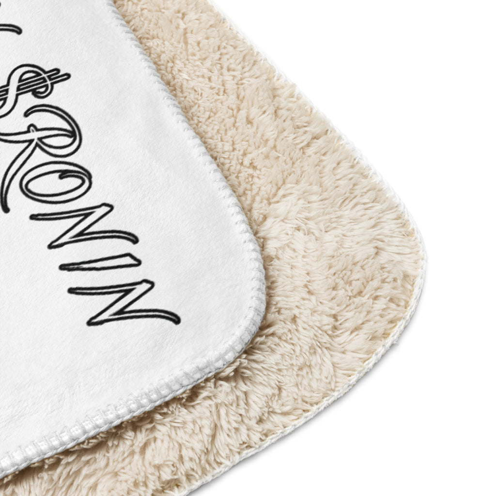 Ronin Crest Sherpa Blanket: white sherpa blanket with a black RONIN crest panel and $RONIN border