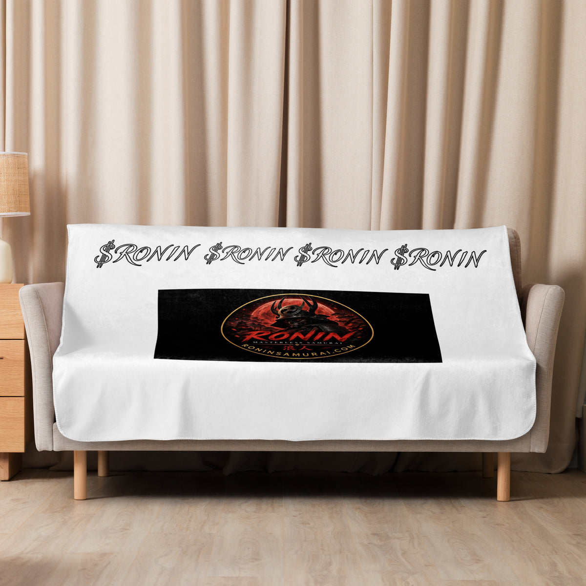 Ronin Crest Sherpa Blanket: white sherpa blanket with a black RONIN crest panel and $RONIN border