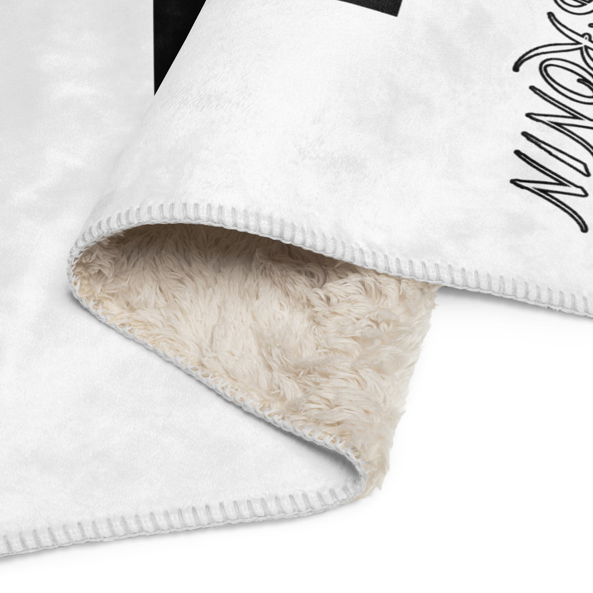 Ronin Crest Sherpa Blanket: white sherpa blanket with a black RONIN crest panel and $RONIN border