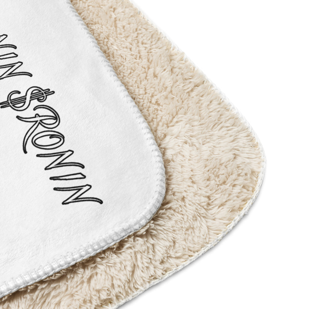 Ronin Crest Sherpa Blanket: white sherpa blanket with a black RONIN crest panel and $RONIN border