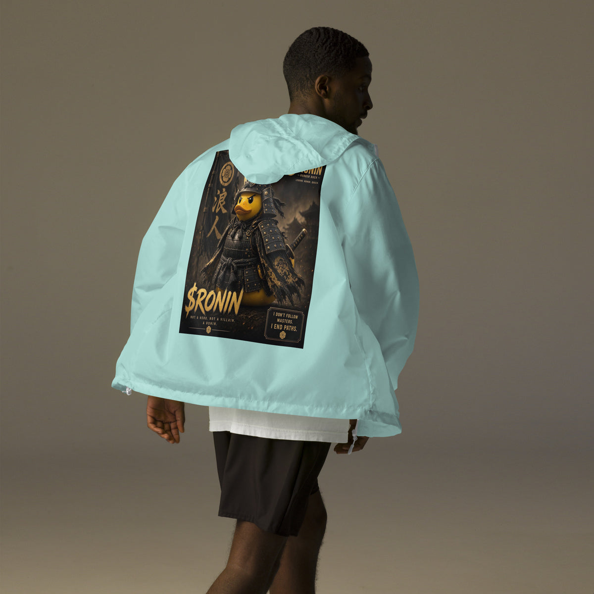 Samurai Rubber Duck Windbreaker, aqua white zipper back: back print of a yellow rubber duck in black-and-gold samurai armor, gold $RONIN