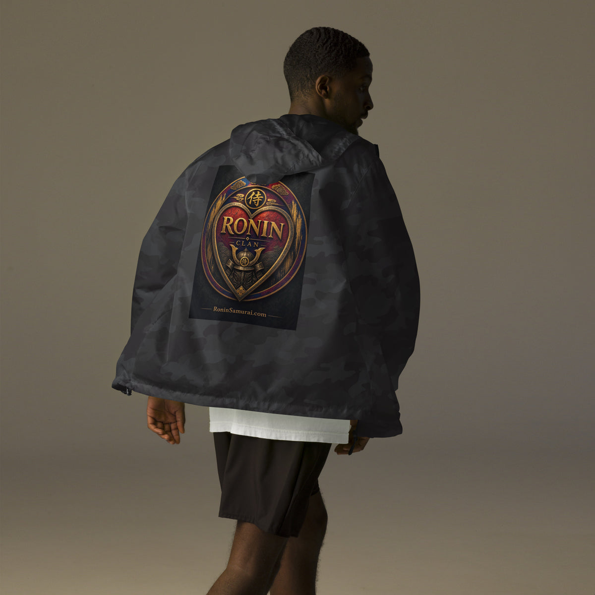 Royal Crest Ronin Clan Windbreaker, black camo back: gilded red-and-gold heart shield with the 侍 seal, RONIN CLAN and kabuto emblem