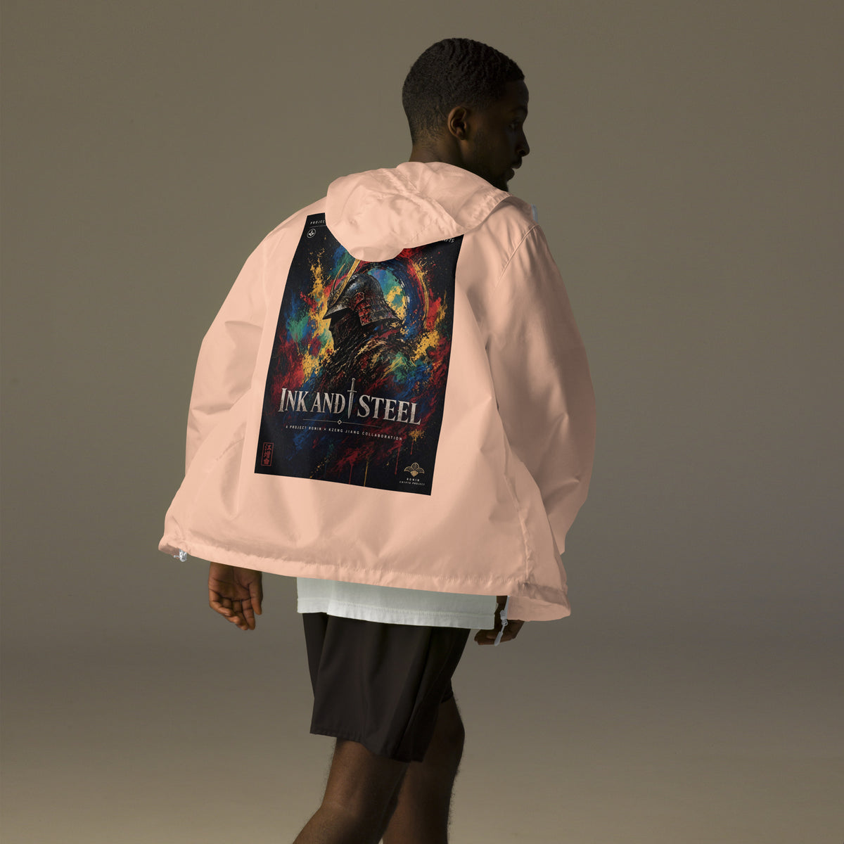 Ink and Steel Samurai Windbreaker, blush white zipper back: back print of a samurai in a gold-crested helmet amid paint splashes, INK AND STEEL