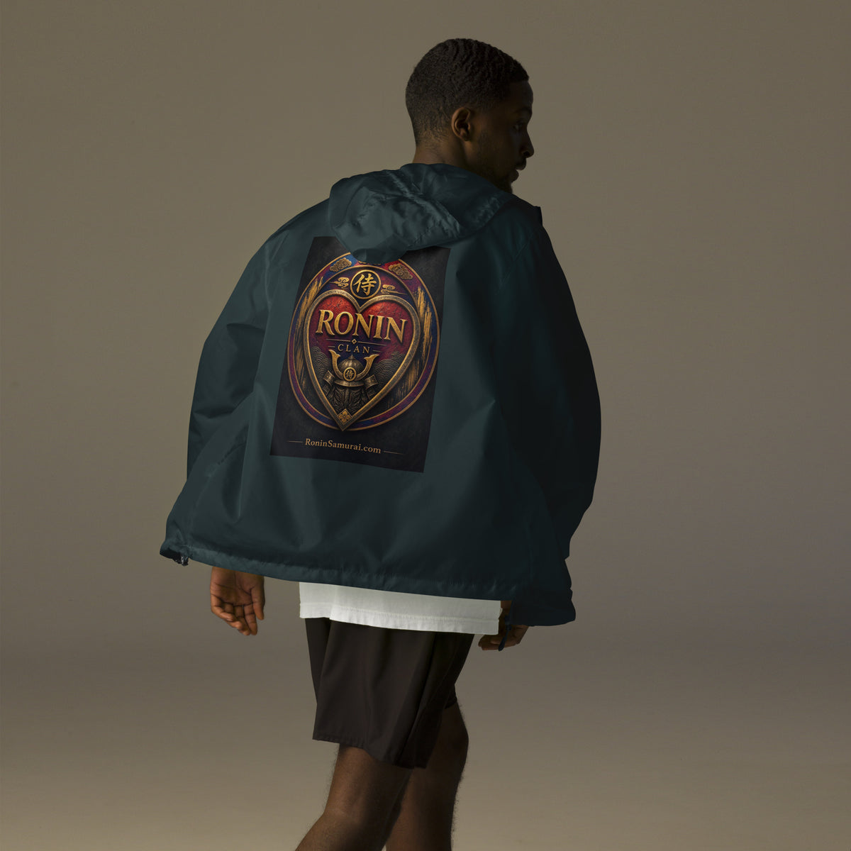 Royal Crest Ronin Clan Windbreaker, classic navy back: gilded red-and-gold heart shield with the 侍 seal, RONIN CLAN and kabuto emblem