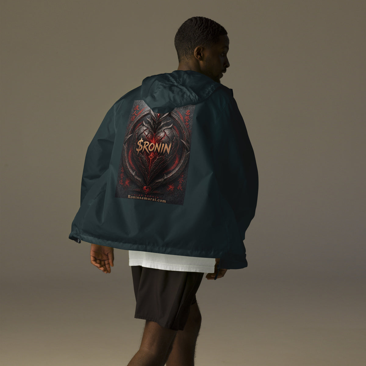 Obsidian Heart Ronin Windbreaker, classic navy back: spiked black armored heart with a glowing red core and $RONIN, red kanji at the sides