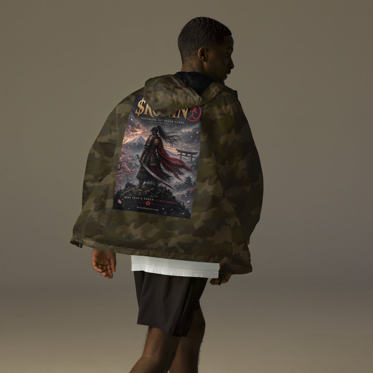 Torii Ridge Ronin Windbreaker, forest camo back: back print of a caped female samurai on a ridge facing Fuji and a torii under gold $RONIN
