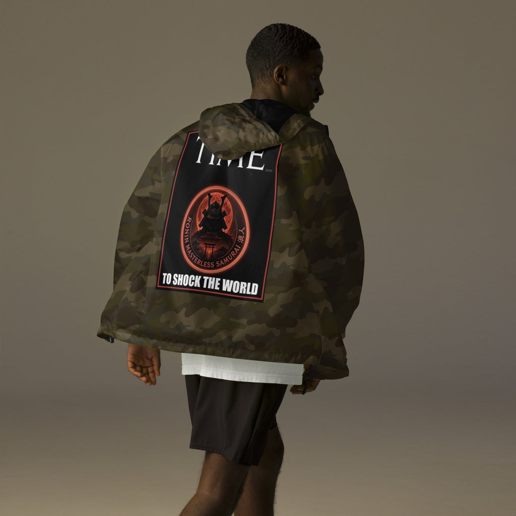 Ronin Cover Story Windbreaker, forest camo back: back print of a red-framed cover-style poster with the round RONIN samurai seal and TO SHOCK THE WORLD