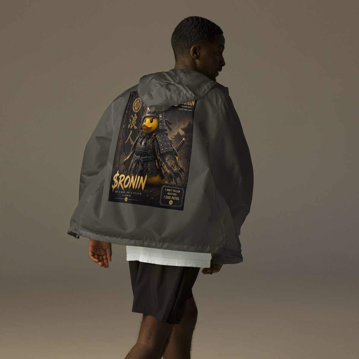 Samurai Rubber Duck Windbreaker, graphite back: back print of a yellow rubber duck in black-and-gold samurai armor, gold $RONIN