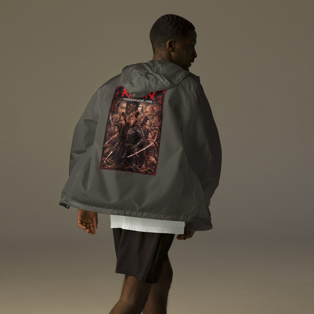 Ronin Warband Windbreaker, graphite back: back print of an armored warband on a burning battlefield under a red RONIN title