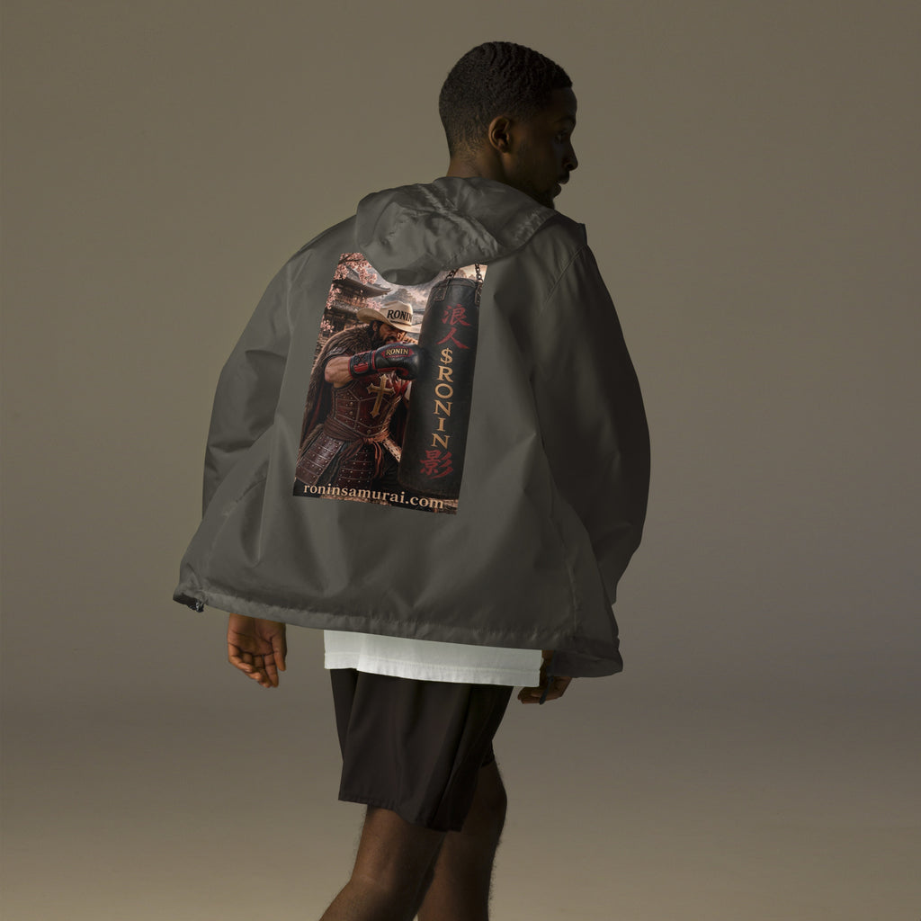 Heavy Bag Ronin Windbreaker, graphite back: back print of a cowboy-hat samurai boxer punching a heavy bag lettered 浪人 $RONIN