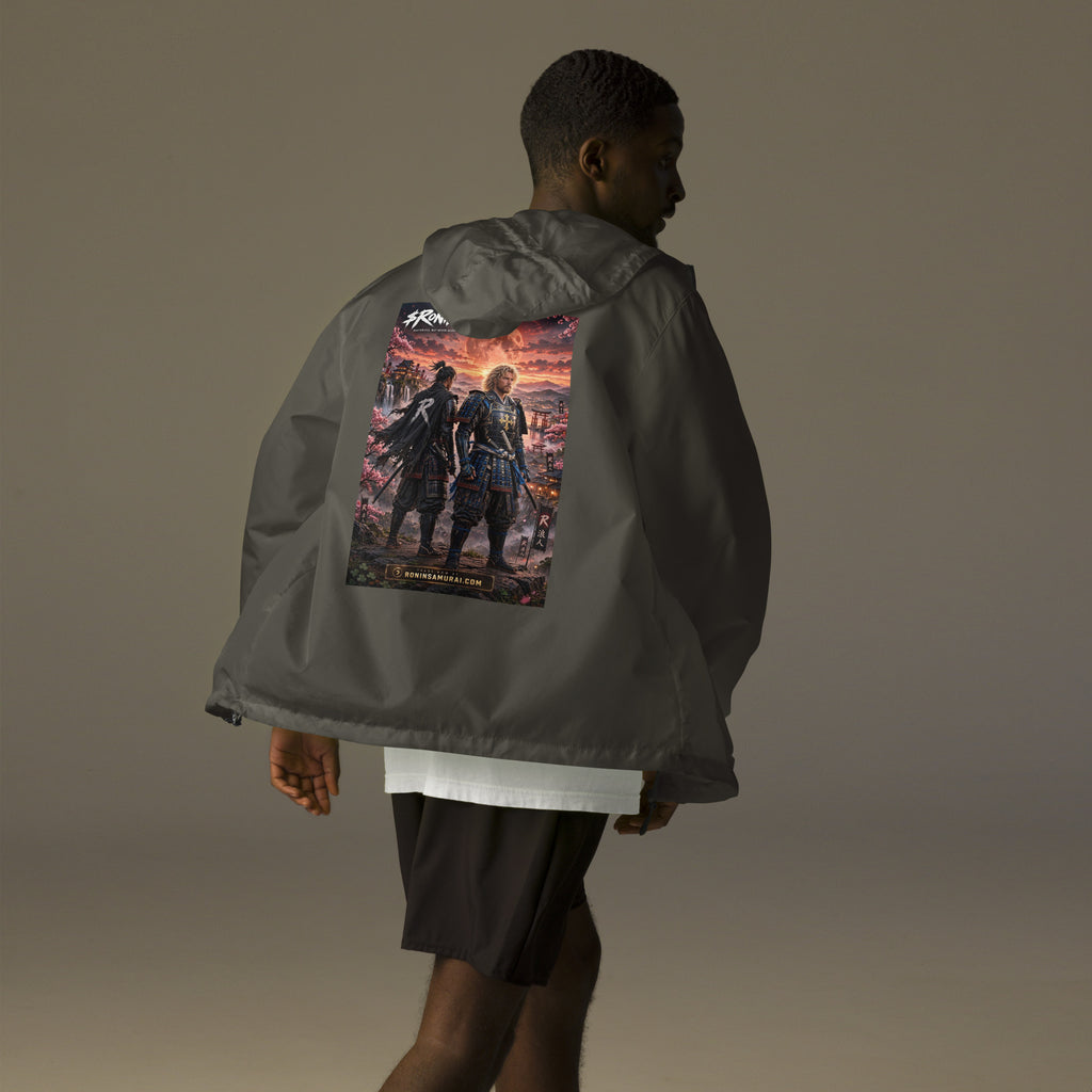 Sworn Brothers Ronin Windbreaker, graphite back: two warriors, a dark-haired ronin and a golden-haired samurai in blue armor, under a blood-red moon with a white $RONIN