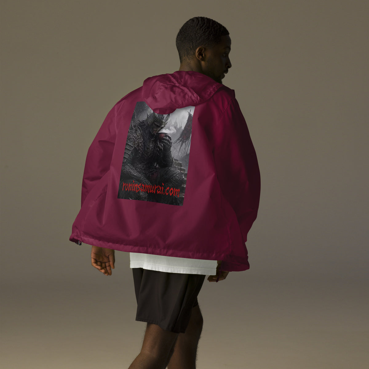 Warlord's Brew Windbreaker, maroon back: back print of a dark horned armored warlord sipping a steaming cup