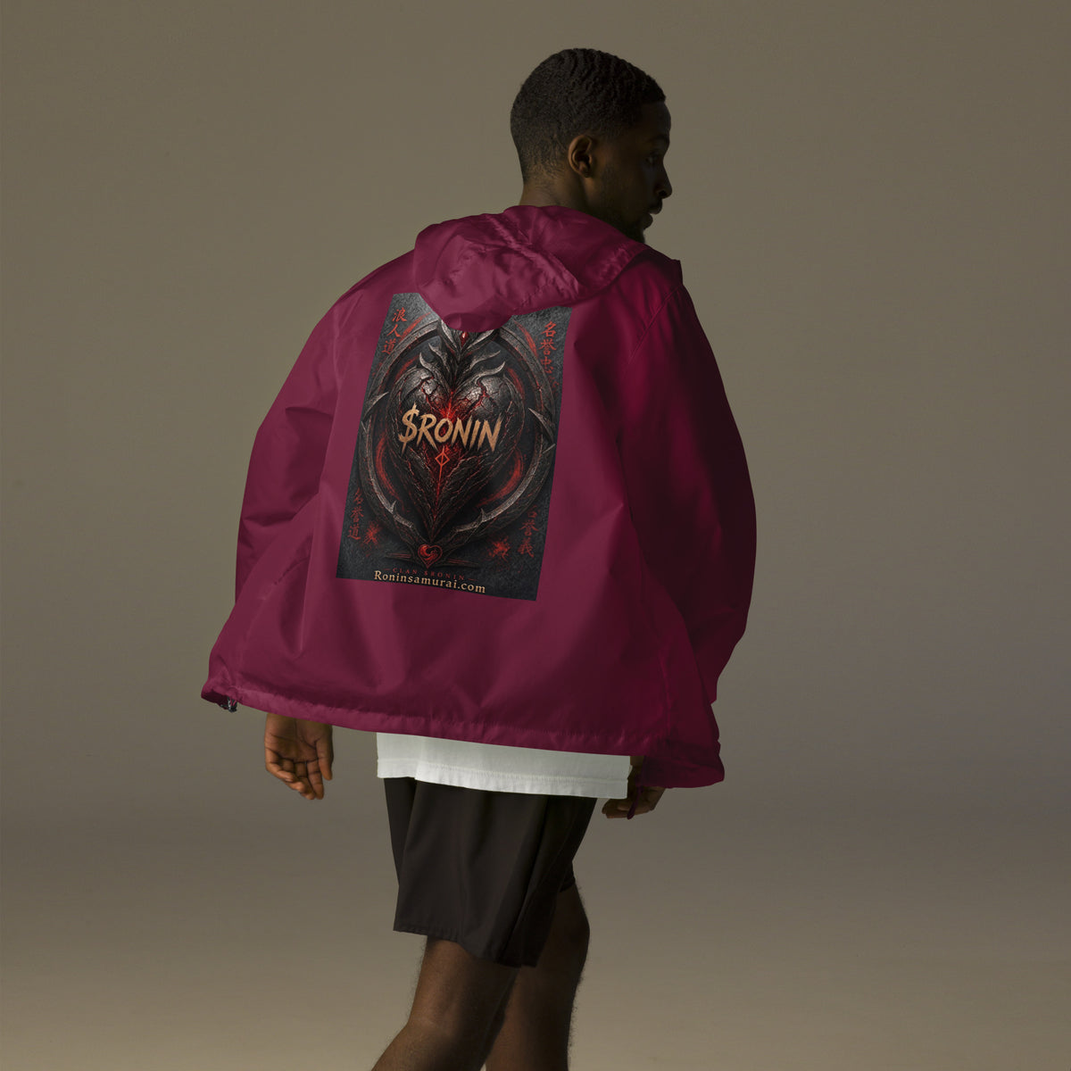Obsidian Heart Ronin Windbreaker, maroon back: spiked black armored heart with a glowing red core and $RONIN, red kanji at the sides