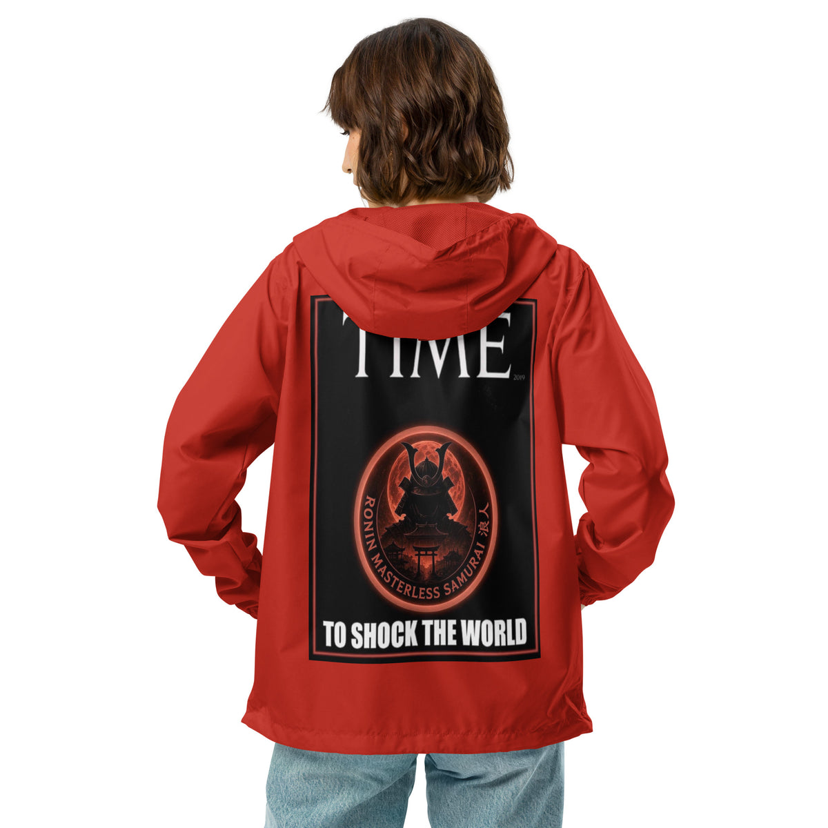 Ronin Cover Story Windbreaker, red back: back print of a red-framed cover-style poster with the round RONIN samurai seal and TO SHOCK THE WORLD