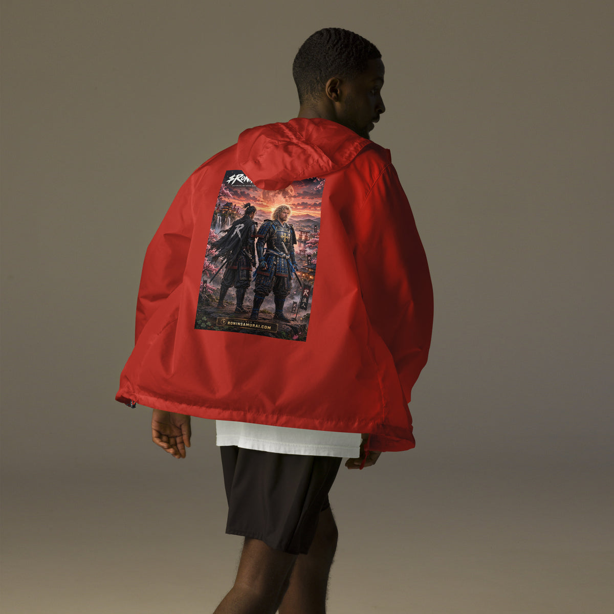 Sworn Brothers Ronin Windbreaker, red back: two warriors, a dark-haired ronin and a golden-haired samurai in blue armor, under a blood-red moon with a white $RONIN